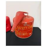 Group of 4 Red Gas Cans and Safety Containers with Spouts