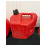 Group of 4 Red Gas Cans and Safety Containers with Spouts