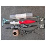 Mixed Household and Outdoor Lot with Yoga Mat, Rake, Umbrellas, Plant Pot, and Mercedes-Benz License Frame