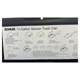 Kohler 13-Gallon Stainless Steel Sensor Trash Can - used condition - small dents