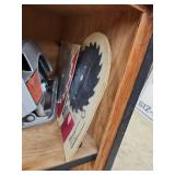 Cabinet with Power Tools, Circular Saws, Sanders, and Sandpaper Rolls