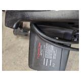 Cabinet with Power Tools, Circular Saws, Sanders, and Sandpaper Rolls