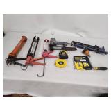 Mixed Lot of Caulking Guns, Tape Measures, Stanley Hand Saw, and Pneumatic Tools