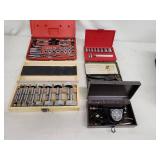 Assorted Workshop Tool Sets Including Tap and Die Set, Forstner Bit Set, Gasket Punch Set, and Vibra Engraving Tool