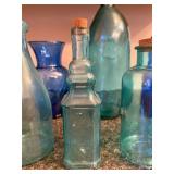 Collection of 7 Blue and Aqua Glass Bottles and Vases