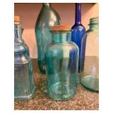 Collection of 7 Blue and Aqua Glass Bottles and Vases