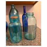 Collection of 7 Blue and Aqua Glass Bottles and Vases