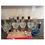 Collection of Vintage Glass Oil Lamps, Crystal Glassware, and Salt Shakers