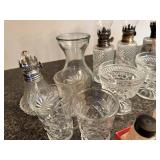 Collection of Vintage Glass Oil Lamps, Crystal Glassware, and Salt Shakers