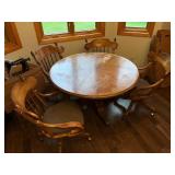 Wood Dining Table with 4 Rolling Chairs