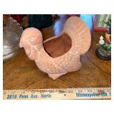 Assorted Collectibles: Porcelain Dolls, Glass Hen Dish, Birdhouse, and Decorative Figurines