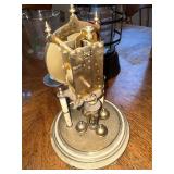 Mixed Vintage Decor Lot with Kundo Anniversary Clock, Lantern, and Collectibles