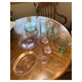 Vintage Glassware Collection Including Pink Depression Glass Plates and Green Bakeware