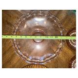 Vintage Glassware Collection Including Pink Depression Glass Plates and Green Bakeware