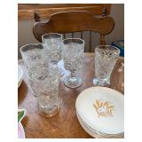 Mixed Vintage Tableware Set with Glass Goblets, Plates, Bowls, and Decorative Tray