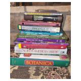 Collection of Books and Harmonica Including Field Guide, Gardening, and Travel