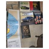 Book Collection with World Map - Muscle Cars, Genealogy, Founding Fathers, The Hooked X