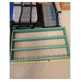 Quilting and Sewing Supply Lot with Wool Pressing Mat, Singer Quilting Table, Storage Cases and Thread Rack