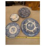 Collection of Blue and White Patterned Porcelain Plates and Bowls