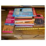 Collection of 11 Mixed Books Including Cookbooks, Maps, and Journals