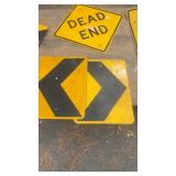 Collection of Used Roadway Traffic Signs Including Dead End and Directional Arrows