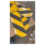 Collection of Used Road Signs Including Yield and Directional Arrows