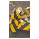 Lot of Used Yellow and Black Reflective Chevron Traffic Signs