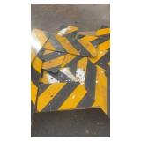 Lot of Used Yellow and Black Reflective Chevron Traffic Signs
