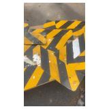 Lot of Used Yellow and Black Reflective Chevron Traffic Signs