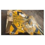 Collection of Used Highway and Road Signs Including No Passing Zone and Dead End