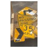 Collection of Used Highway and Road Signs Including No Passing Zone and Dead End