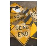 Collection of Used Highway and Road Signs Including No Passing Zone and Dead End