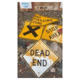 Collection of Vintage Metal Road Signs including Dead End, Yield, and Stop Ahead