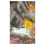 Collection of Vintage Road Signs and License Plates