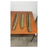 Lot of Belted Rifle Ammunition Rounds in Three Strips