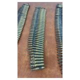 Lot of Belted Rifle Ammunition Rounds in Three Strips