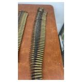 Lot of Belted Rifle Ammunition Rounds in Three Strips