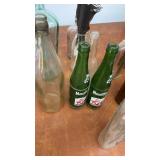 Collection of Vintage Glass Bottles and Jars