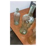 Collection of Vintage Glass Bottles and Jars