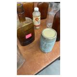 Collection of Vintage Glass Bottles and Jars