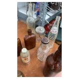 Collection of Vintage Glass Bottles and Jars