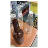 Collection of Vintage Glass Bottles and Jars