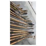 Group of 17 Vintage Wooden and Composite Hockey Sticks