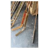 Group of 17 Vintage Wooden and Composite Hockey Sticks