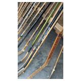 Group of 17 Vintage Wooden and Composite Hockey Sticks