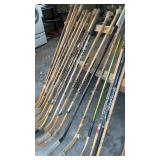 Group of 17 Vintage Wooden and Composite Hockey Sticks
