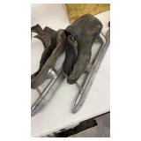 Vintage Collection including Ice Skates, Iron, Cowbell, and Brass Bin