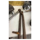 Vintage Collection including Ice Skates, Iron, Cowbell, and Brass Bin