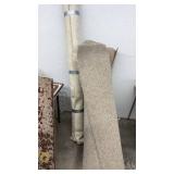 Collection of Assorted Rolled Carpets and Remnants