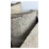 Collection of Assorted Rolled Carpets and Remnants